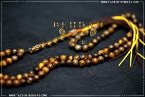 تسبیح چشم ببر | تسبیح با سنگ معدنی چشم ببر | تسبیح با سنگ طبیعی تایگر | فروشگاه و کارگاه تولید تسبیح چشم ببر بهداد | گوهر چشم ببر | تایگر زیبا | رنگ چشم ببر | معدن چشم ببر | جنس چشم ببر | معادن چشم ببر | تایگر خوش رخ | Tiger's Eye | Tiger's Eye Rosary | rosary | tasbih behdad | tasbih | behdad | تسبیح | 