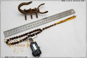 تسبیح چشم ببر | تسبیح با سنگ معدنی چشم ببر | تسبیح با سنگ طبیعی تایگر | فروشگاه و کارگاه تولید تسبیح چشم ببر بهداد | گوهر چشم ببر | تایگر زیبا | رنگ چشم ببر | معدن چشم ببر | جنس چشم ببر | معادن چشم ببر | تایگر خوش رخ | Tiger's Eye | Tiger's Eye Rosary | rosary | tasbih behdad | tasbih | behdad | تسبیح | 