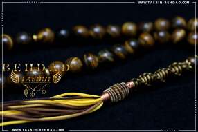 تسبیح چشم ببر | تسبیح با سنگ معدنی چشم ببر | تسبیح با سنگ طبیعی تایگر | فروشگاه و کارگاه تولید تسبیح چشم ببر بهداد | گوهر چشم ببر | تایگر زیبا | رنگ چشم ببر | معدن چشم ببر | جنس چشم ببر | معادن چشم ببر | تایگر خوش رخ | Tiger's Eye | Tiger's Eye Rosary | rosary | tasbih behdad | tasbih | behdad | تسبیح | 