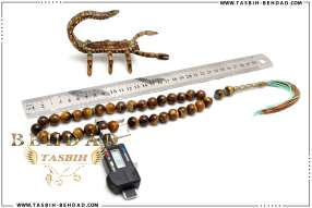 تسبیح چشم ببر | تسبیح با سنگ معدنی چشم ببر | تسبیح با سنگ طبیعی تایگر | فروشگاه و کارگاه تولید تسبیح چشم ببر بهداد | گوهر چشم ببر | تایگر زیبا | رنگ چشم ببر | معدن چشم ببر | جنس چشم ببر | معادن چشم ببر | تایگر خوش رخ | Tiger's Eye | Tiger's Eye Rosary | rosary | tasbih behdad | tasbih | behdad | تسبیح | 